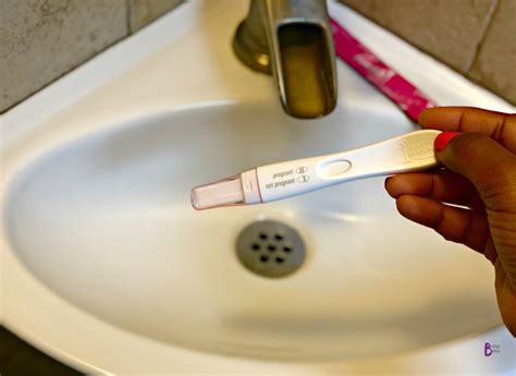 taking a pregnancy test at home